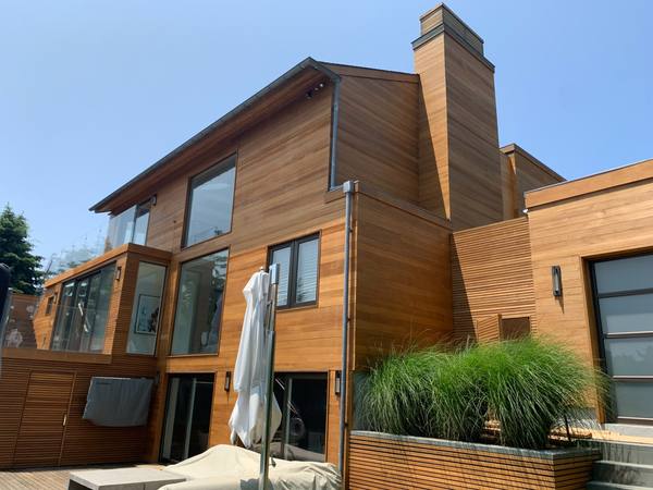 Cedar shingle home exterior painting in Southampton NY