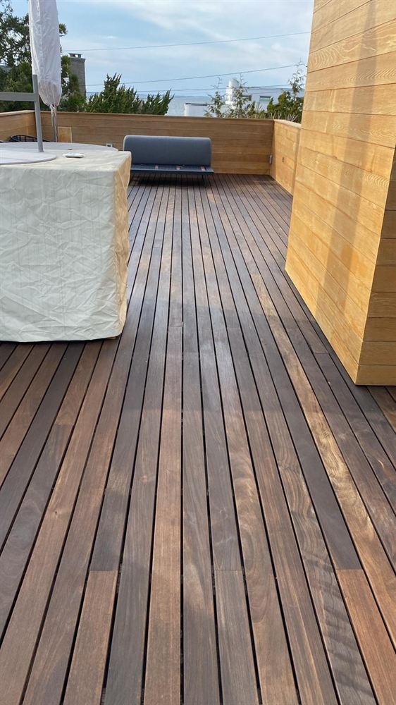 Oiled hardwood rooftop deck at a modern Hamptons home